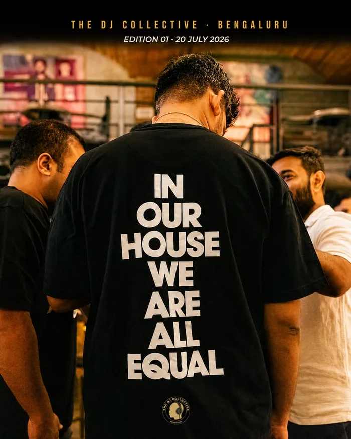 The back of a t-shirt reading "In our house we are all equal"